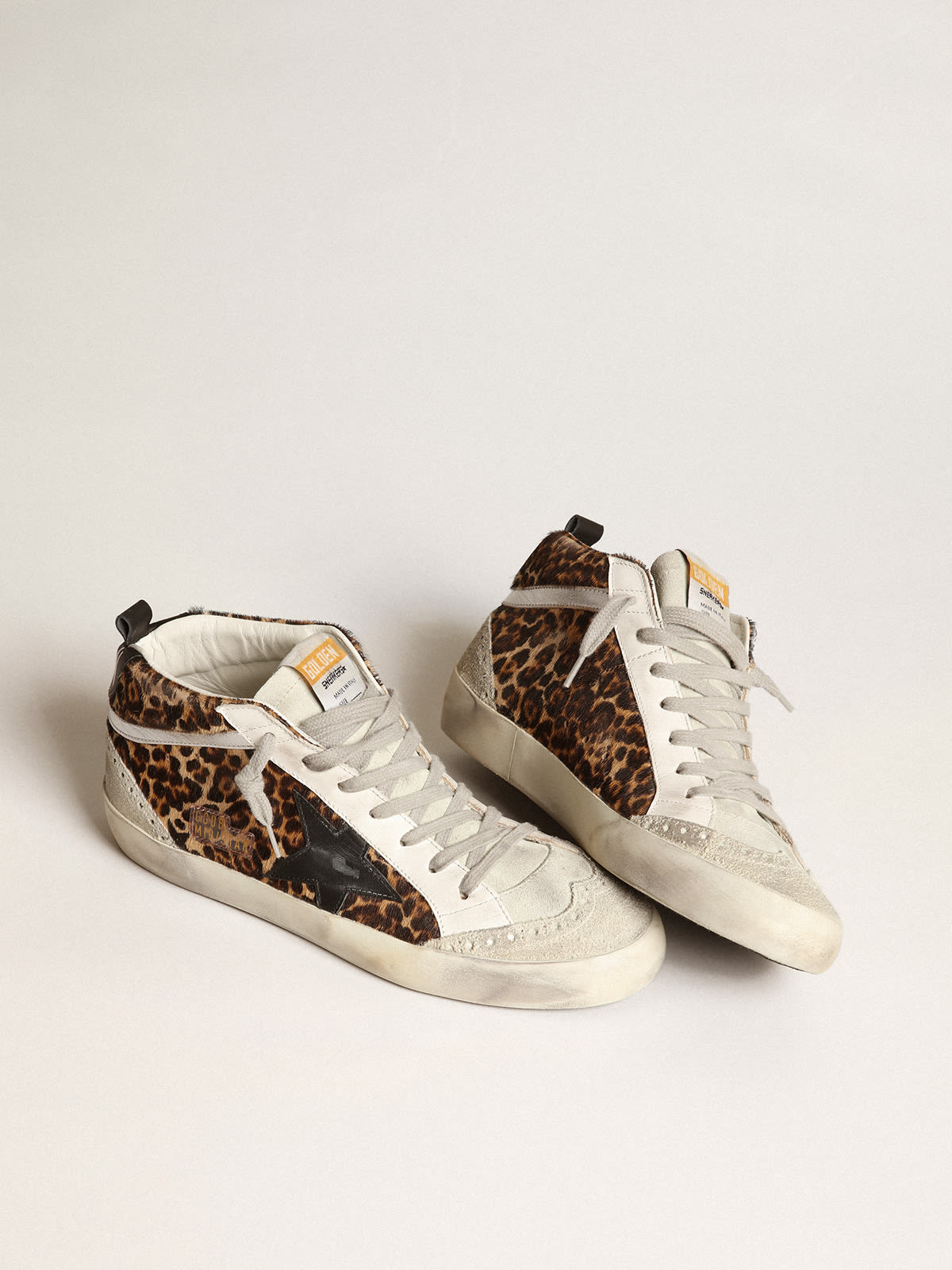 Golden Goose - Mid Star sneakers in leopard-print pony skin with black leather star and silver laminated leather flash in 