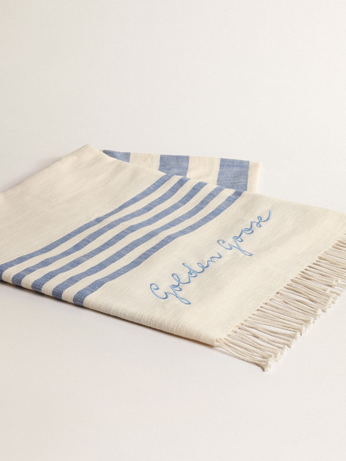 Golden Goose - Resort Collection cotton beach towel with blue stripes and fringing    in 