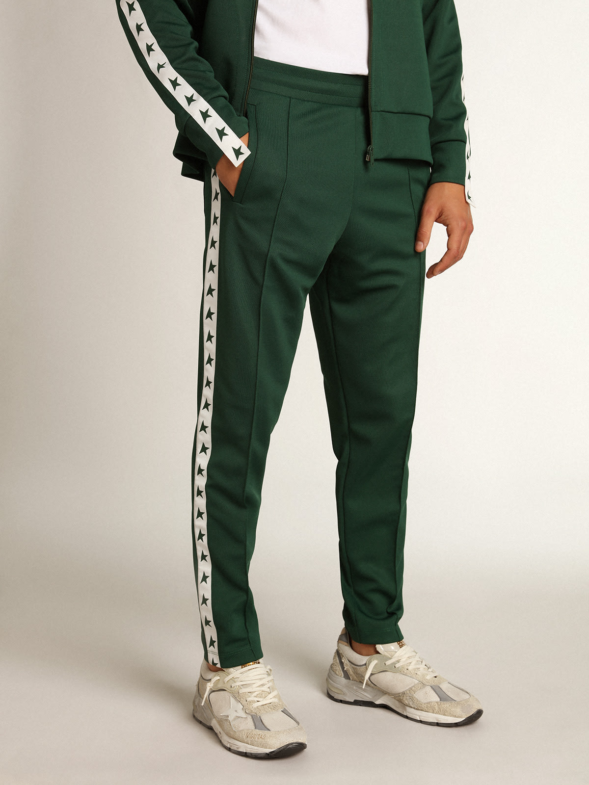 Golden Goose - Men’s green joggers with stars on the sides  in 