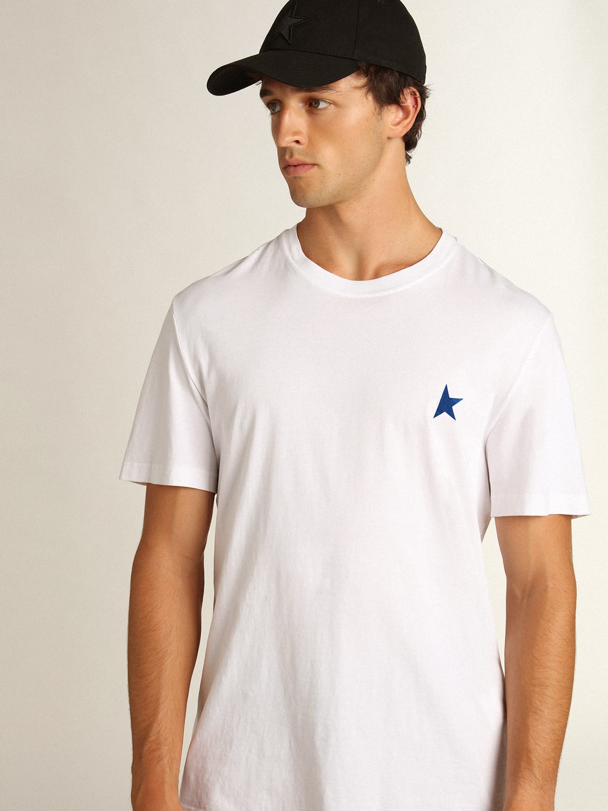 Men’s white T-shirt with dark blue star on the front