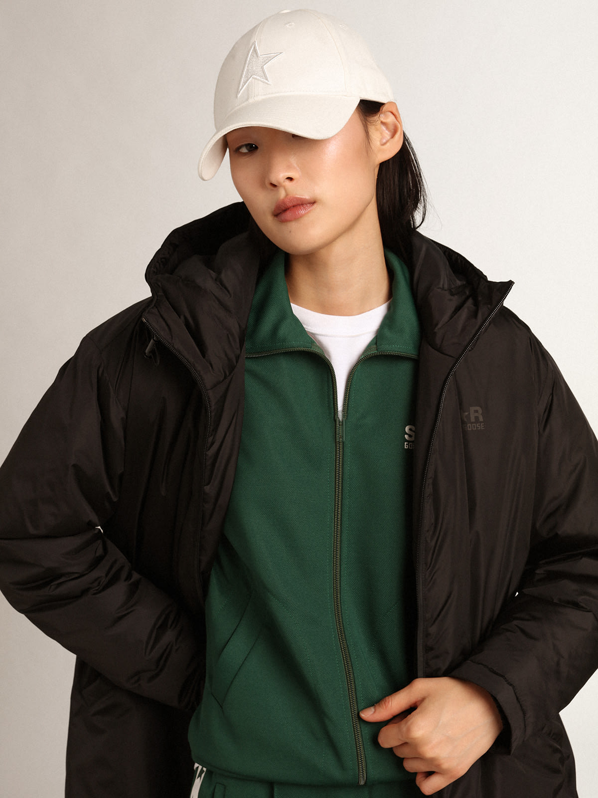 Women's black ankle-length padded jacket with hood