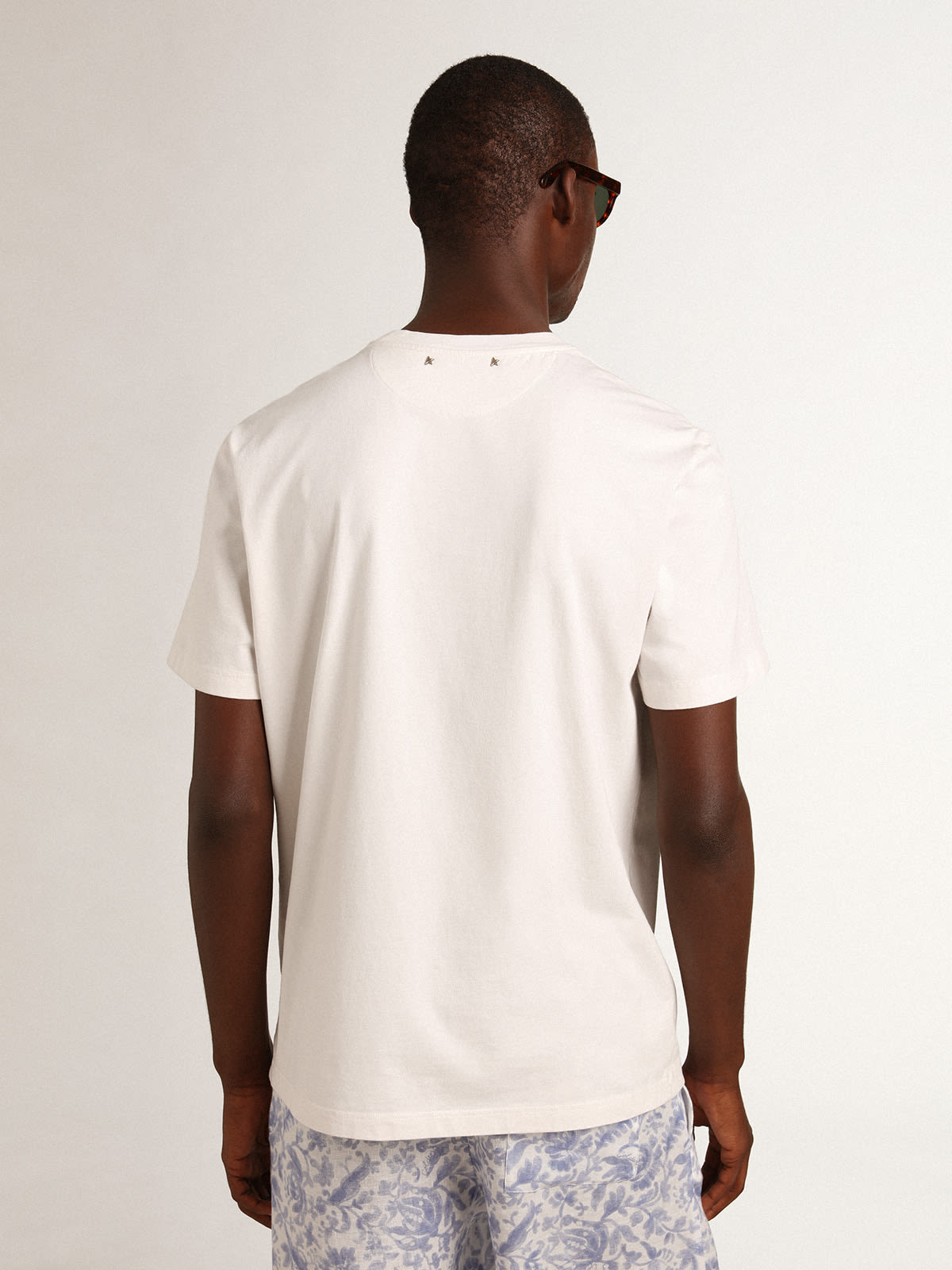 Golden Goose - T-shirt collection Resort en coton blanc vintage avec fleur imprimée in 