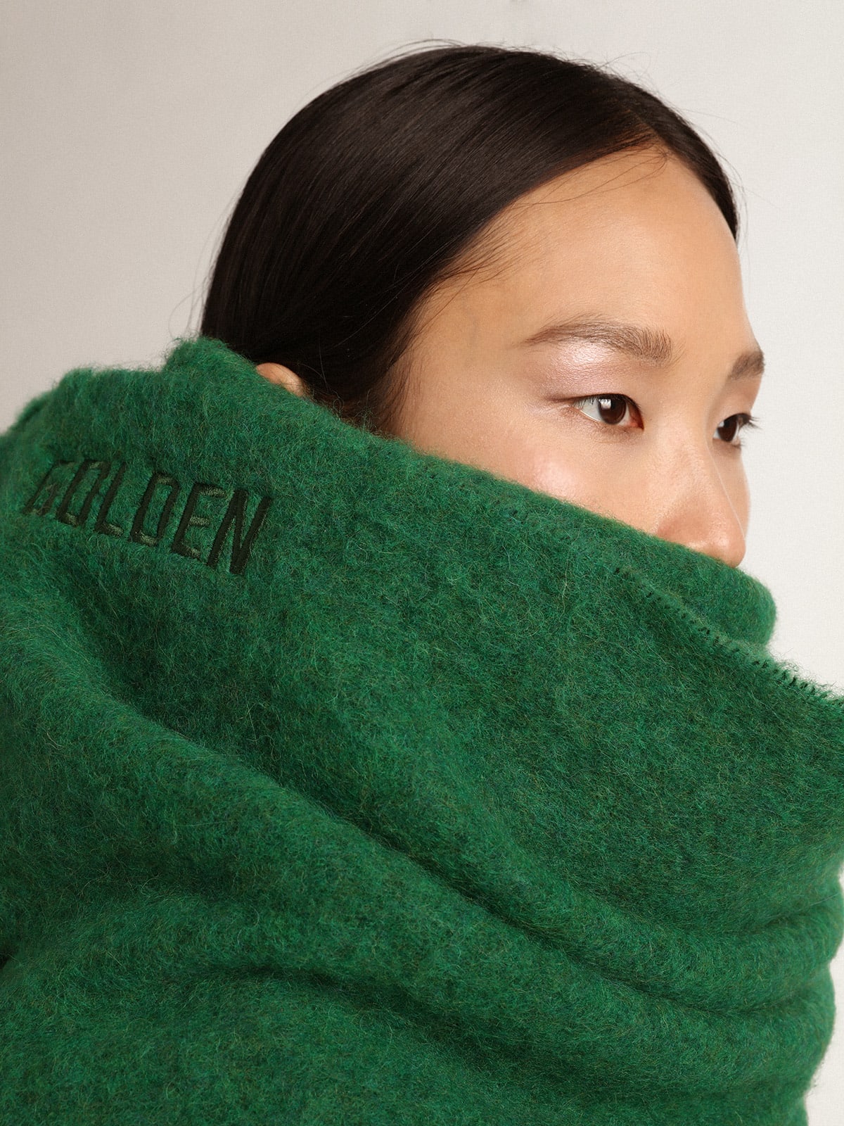 Dark green wool scarf with fringe and 'Golden' lettering | Golden