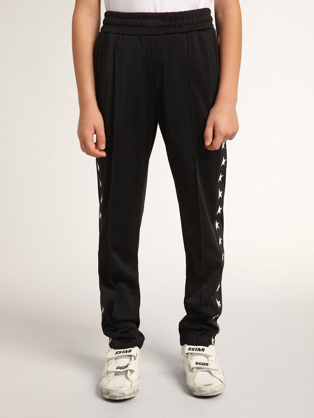 Golden Goose - Joggers negros con estrellas blancas en contraste in 