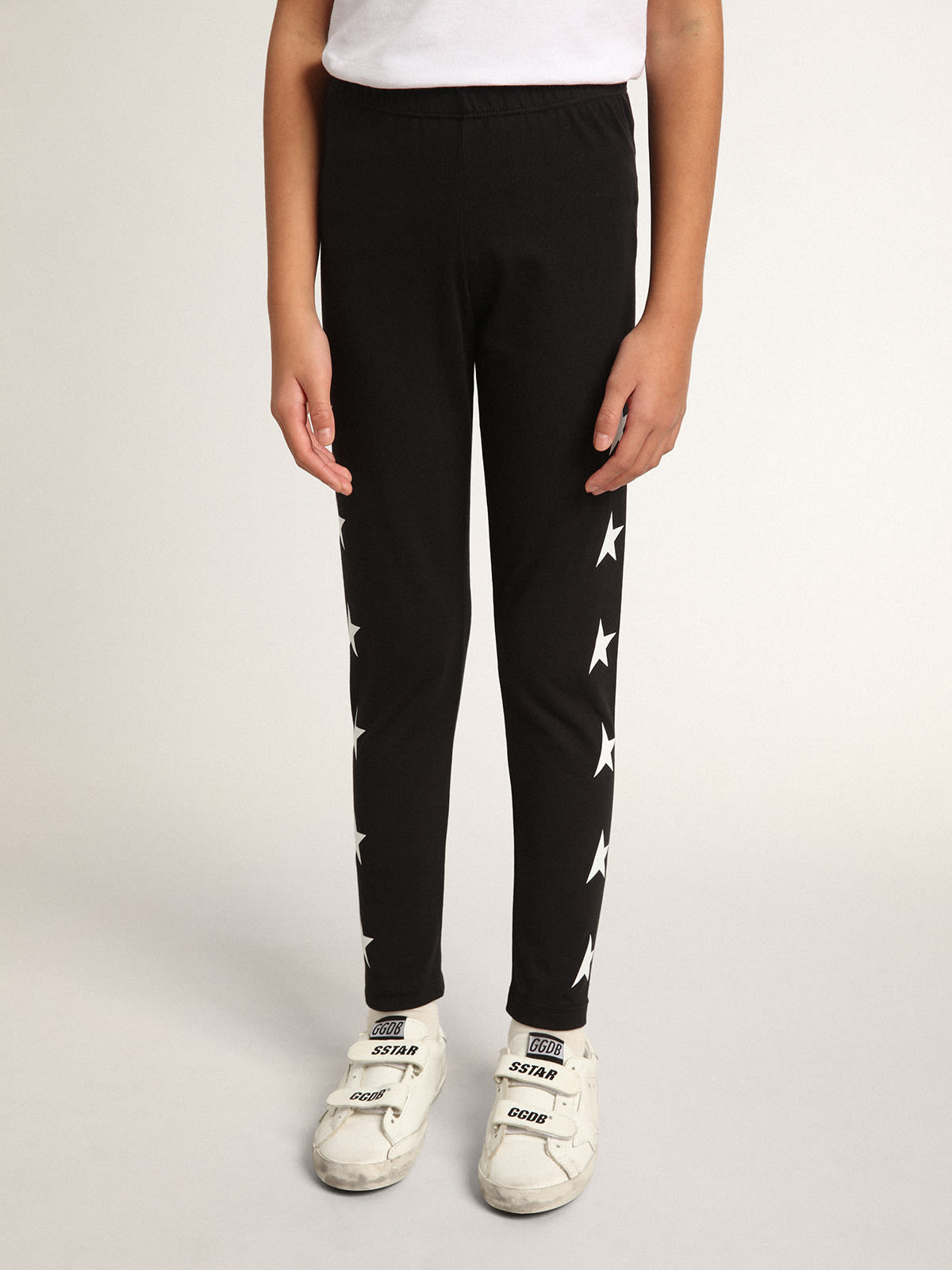 Golden Goose - Calça de legging infantil feminina preta com estrelas brancas nas laterais in 