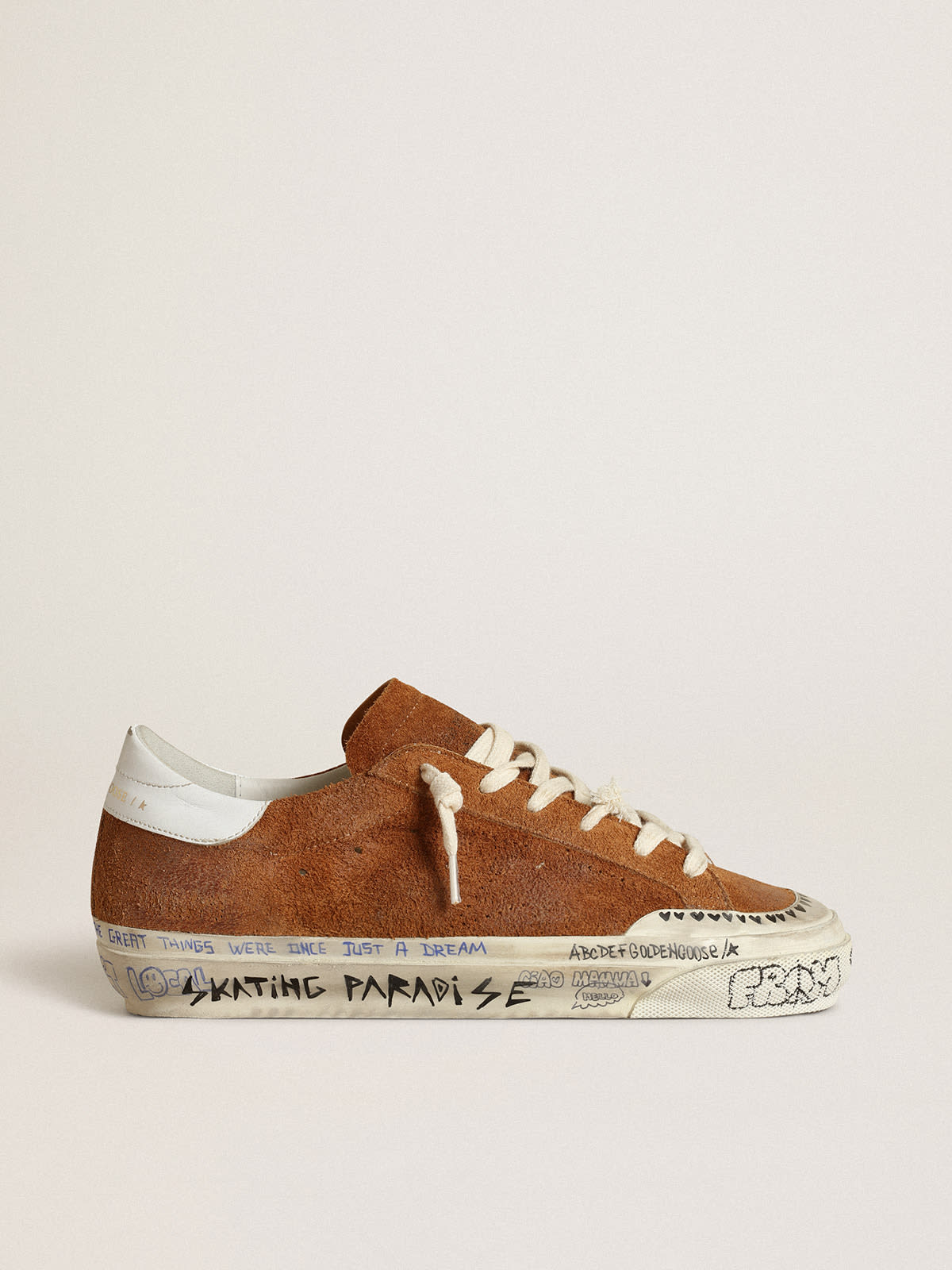 Golden Goose - Women’s Super-Star LTD in tan suede with a perforated star in 