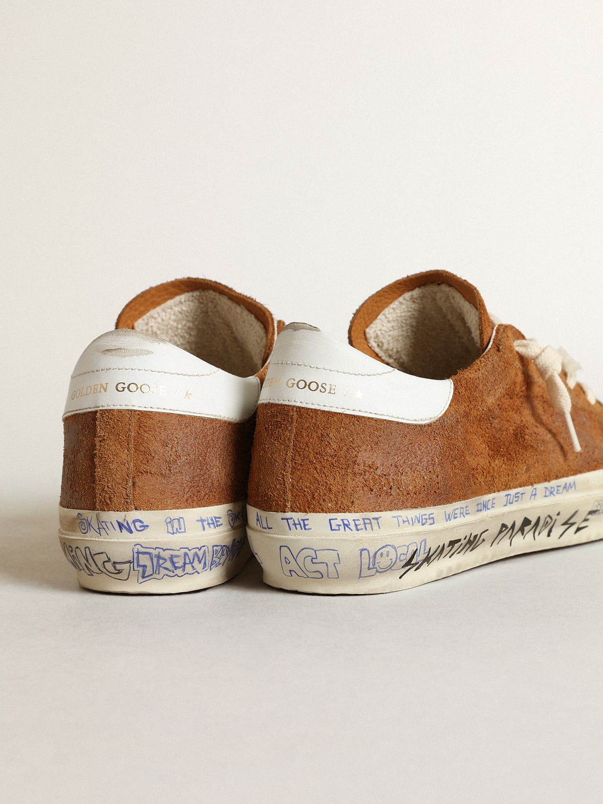 Golden Goose - Women’s Super-Star LTD in tan suede with a perforated star in 