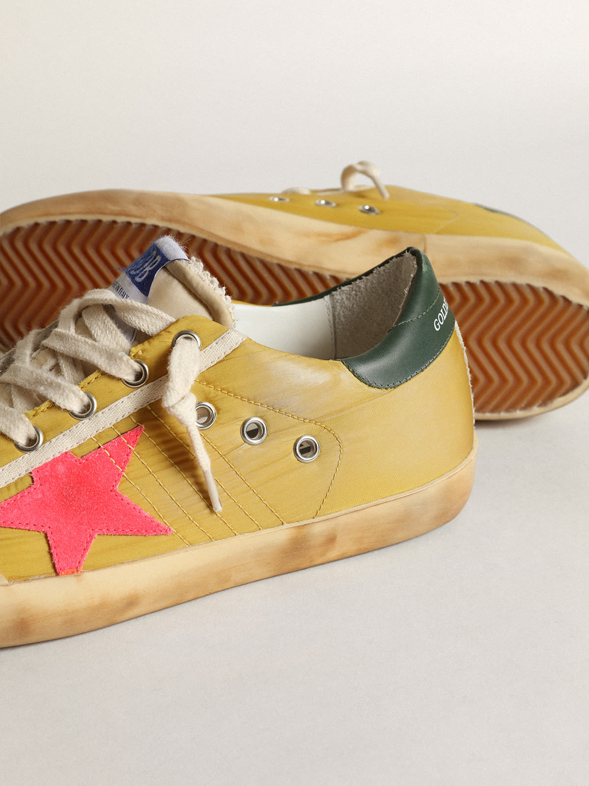 Golden Goose - Super-Star Penstar sneakers in mustard-colored nylon with fluorescent lobster-colored suede star in 