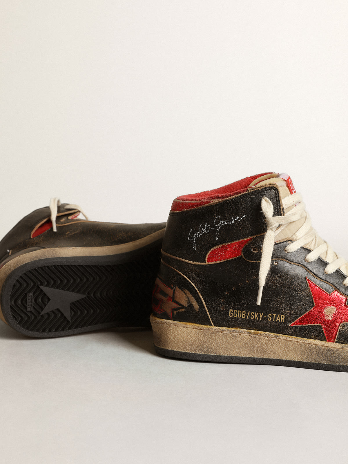 Golden Goose - Women’s Sky-Star in black leather with red metallic leather star in 
