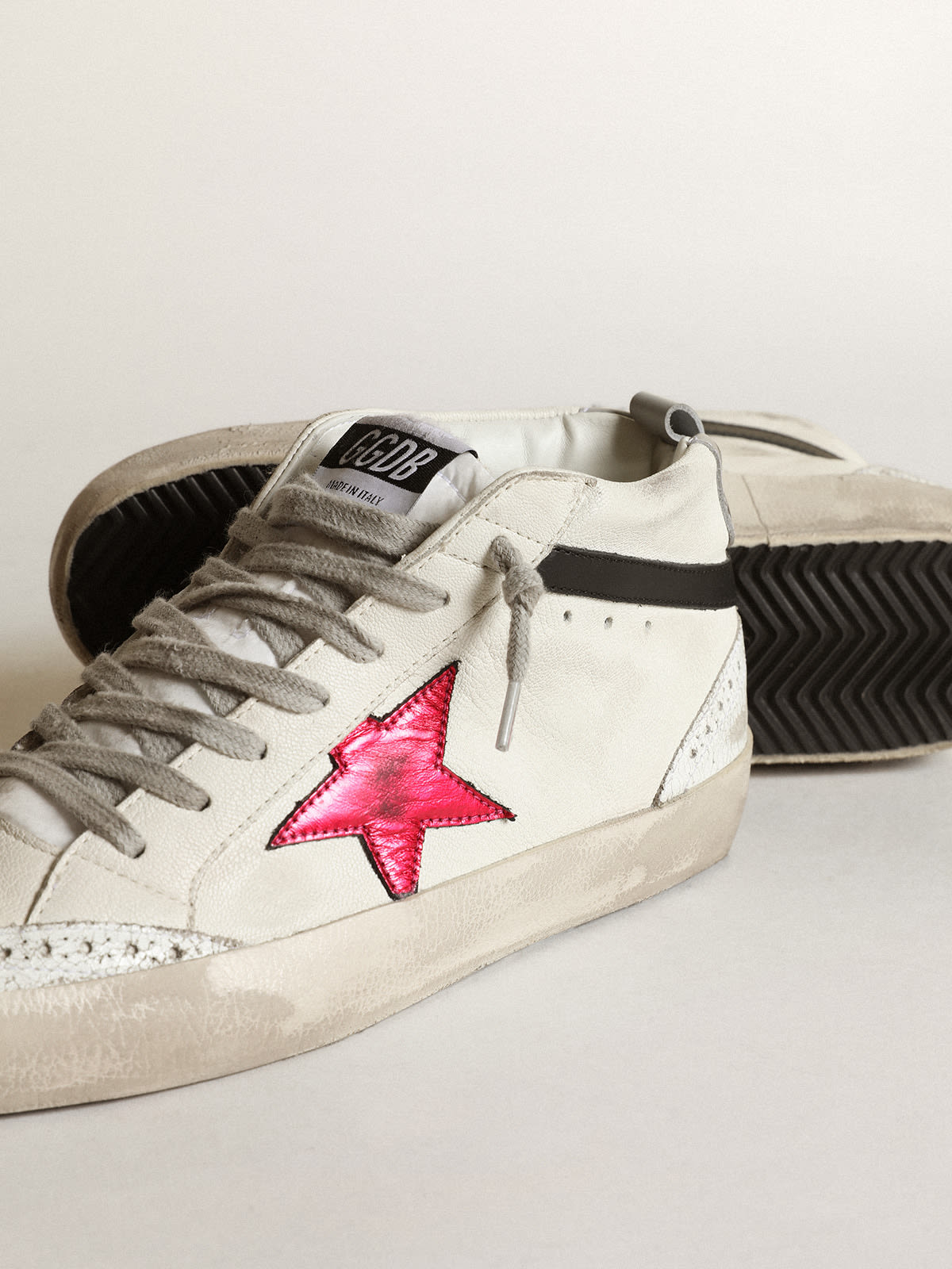 Golden Goose - Mid Star with a pink laminated leather star and black flash in 