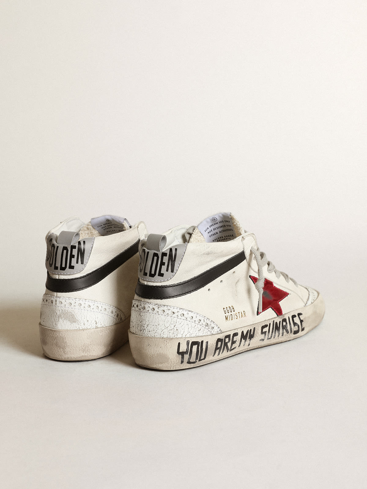 Mid Star with a pink laminated leather star and black flash | Golden Goose