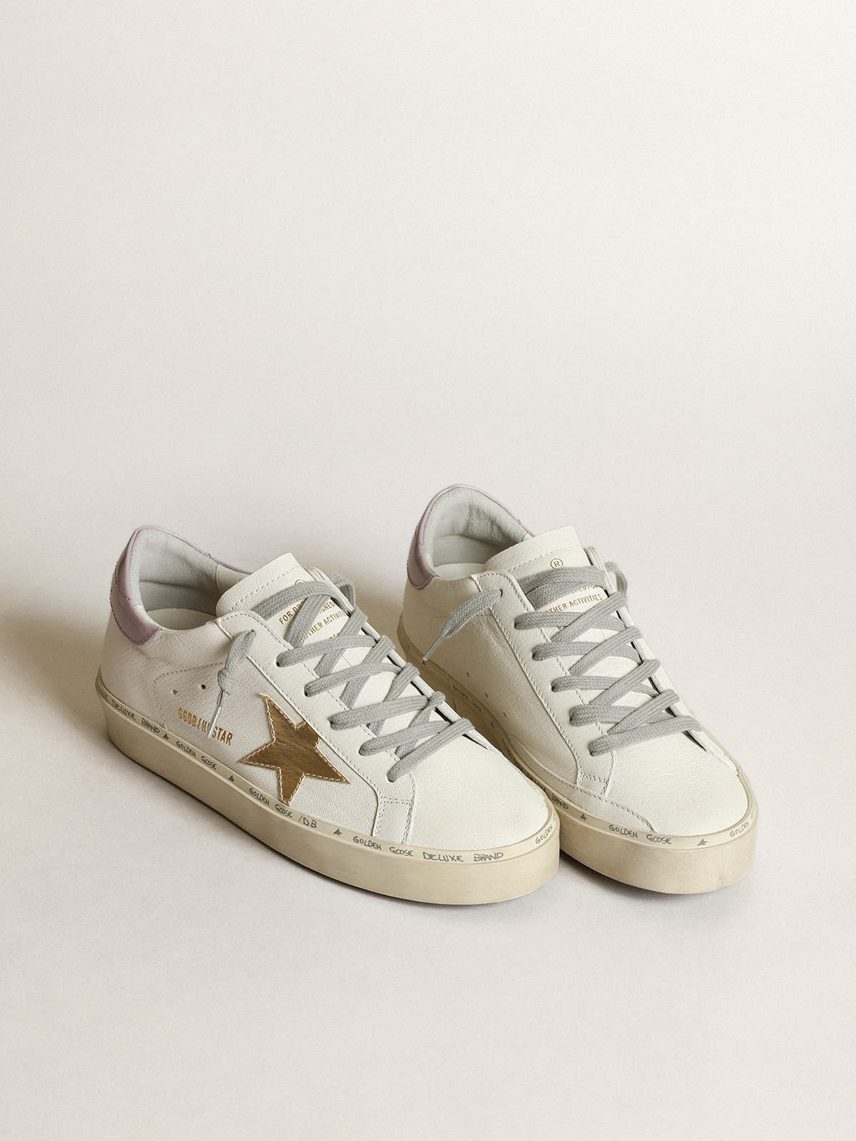 White Hi Star with a gold star and lilac naplak heel tab