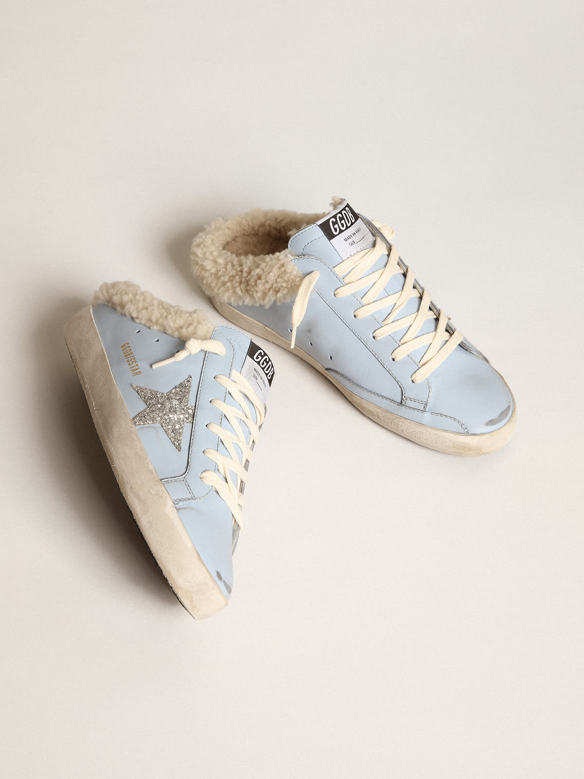 Golden Goose - Super-Star Sabots in powder-blue leather with silver glitter star and beige shearling lining in 