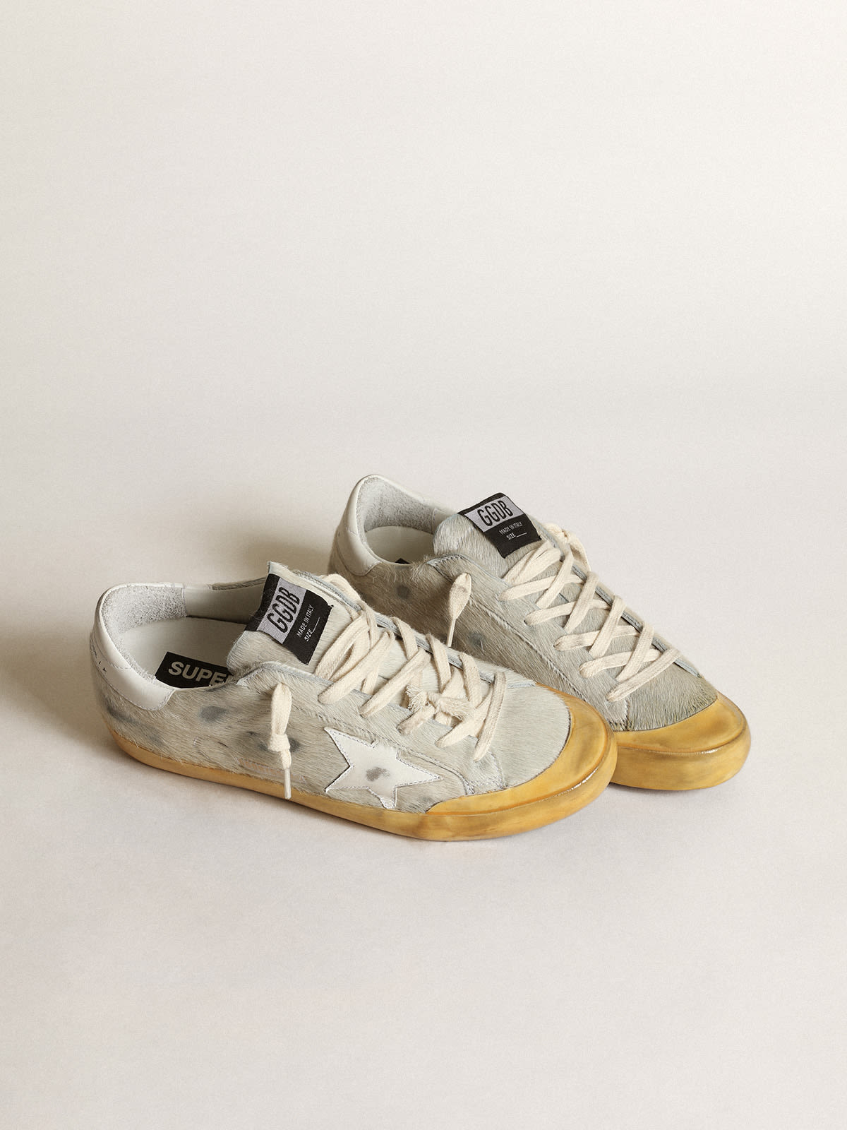 Golden Goose - Sneaker Super-Star Penstar aus Cavallino-Leder in Dirty-White mit Stern und Fersenpartie aus weißem Leder in 