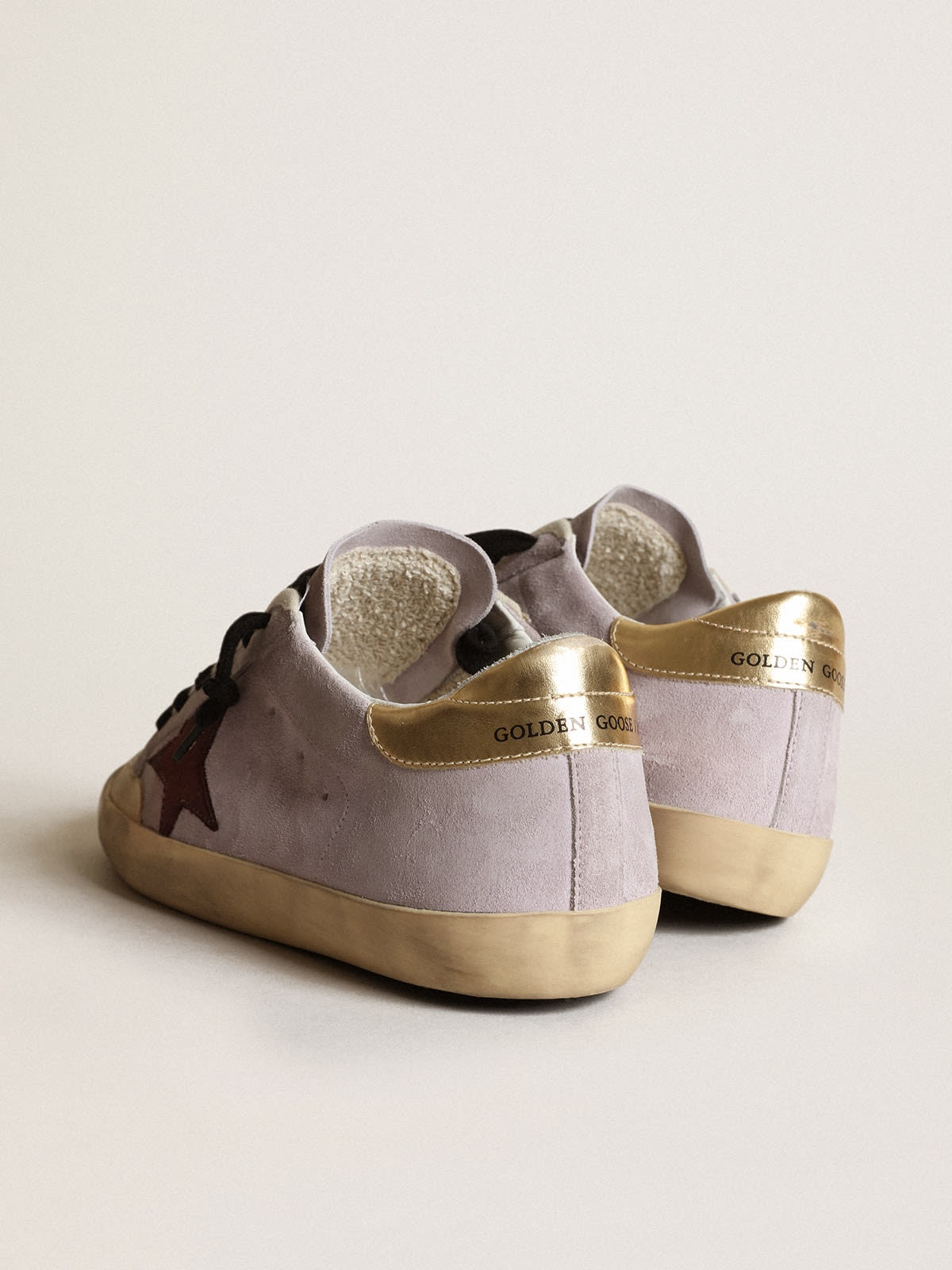 Super-Star in lilac suede with a brown star and gold heel tab