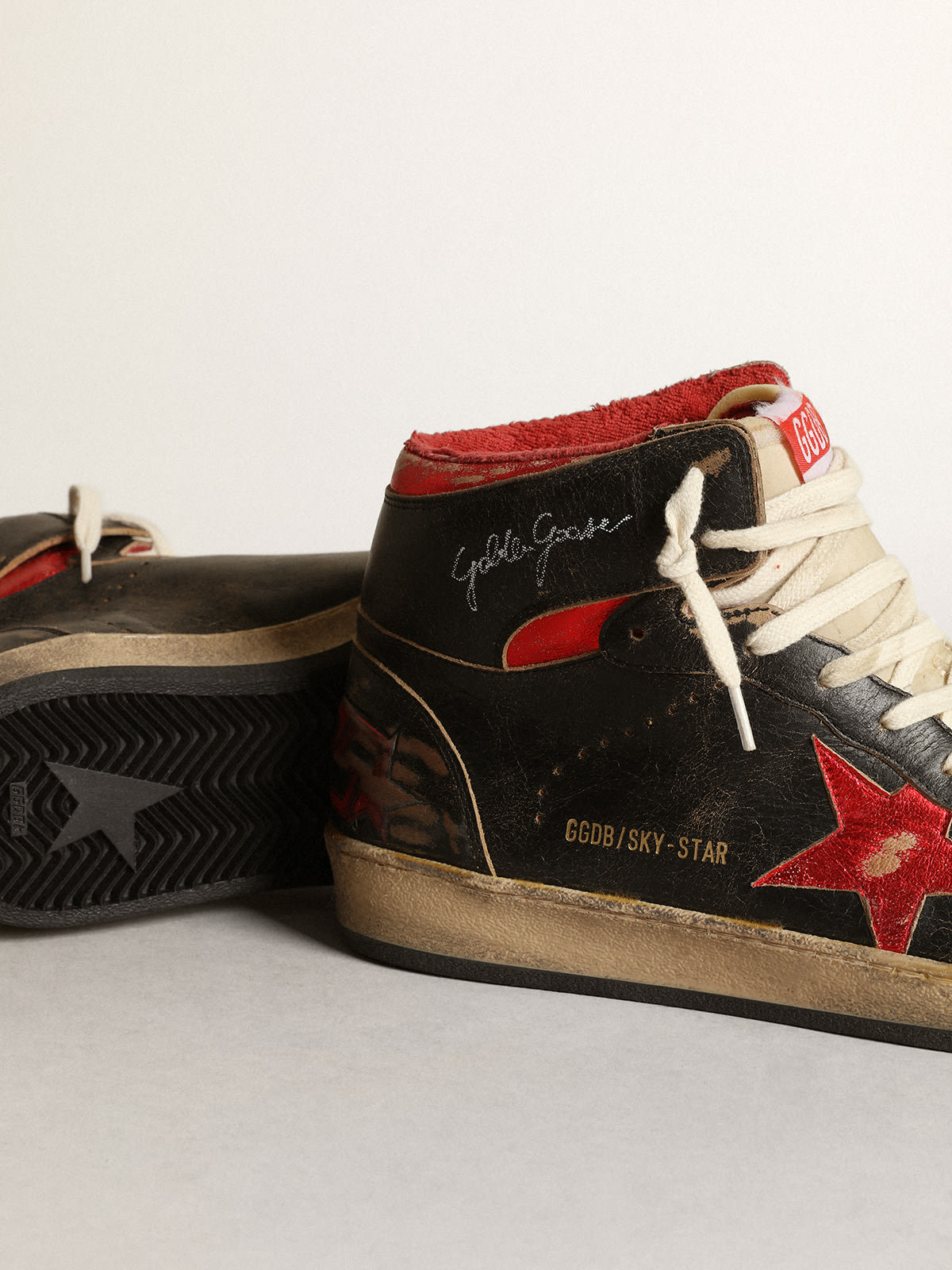 Golden Goose - Sky-Star Men’s sneakers in glossy black leather with red metallic leather star in 