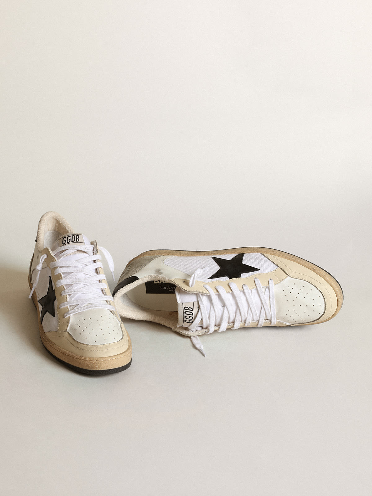 Golden Goose - Men’s Ball Star sneakers in white canvas and leather with ivory leather inserts and black nappa leather star in 