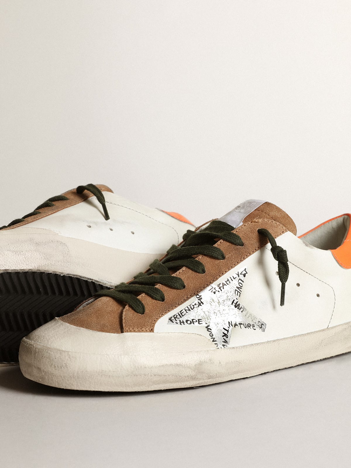 Super-Star Penstar sneakers with silver screen-printed star and fluorescent  orange leather heel tab