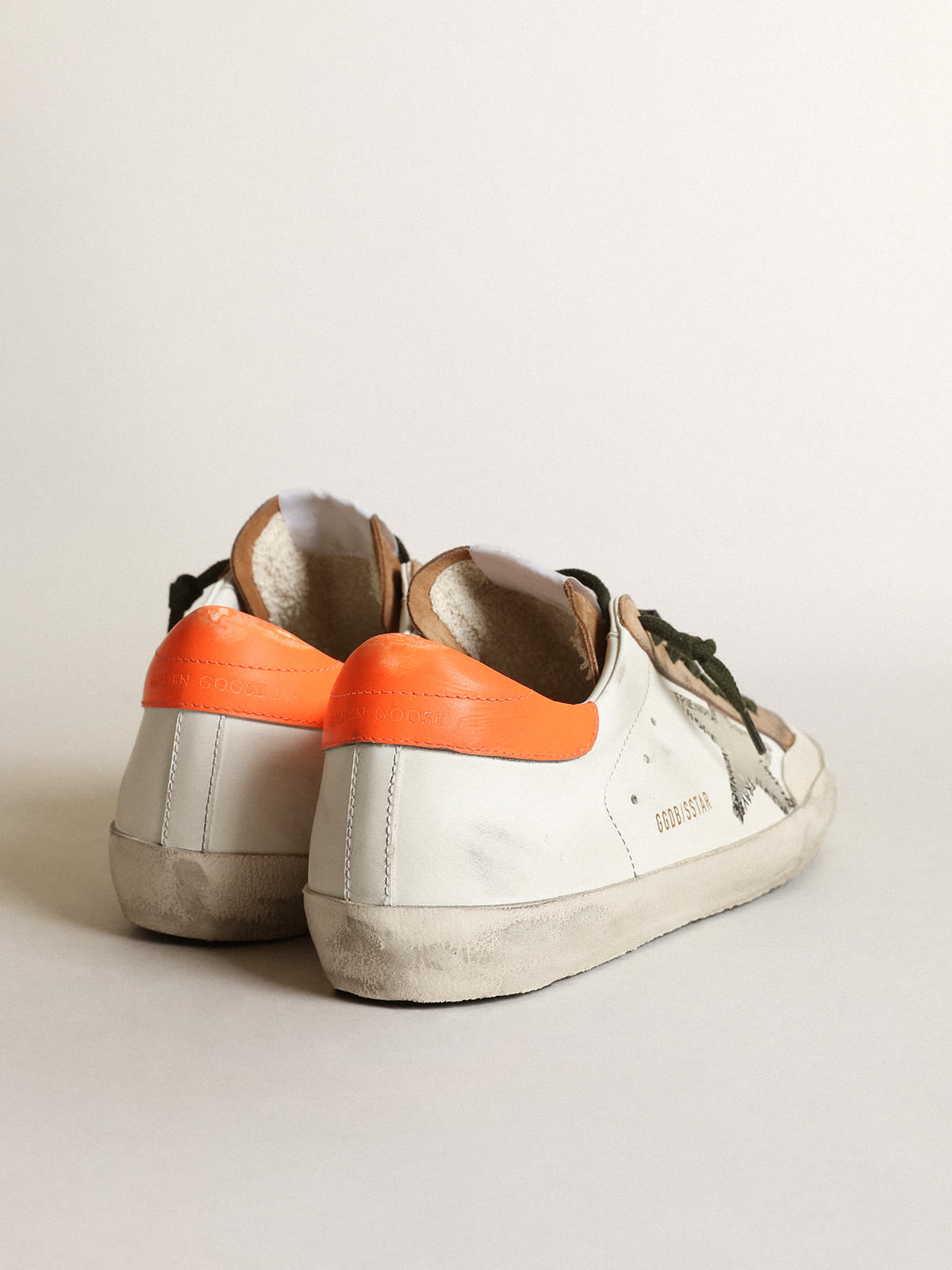 Golden Goose - Super-Star Penstar sneakers with silver screen-printed star and fluorescent orange leather heel tab in 