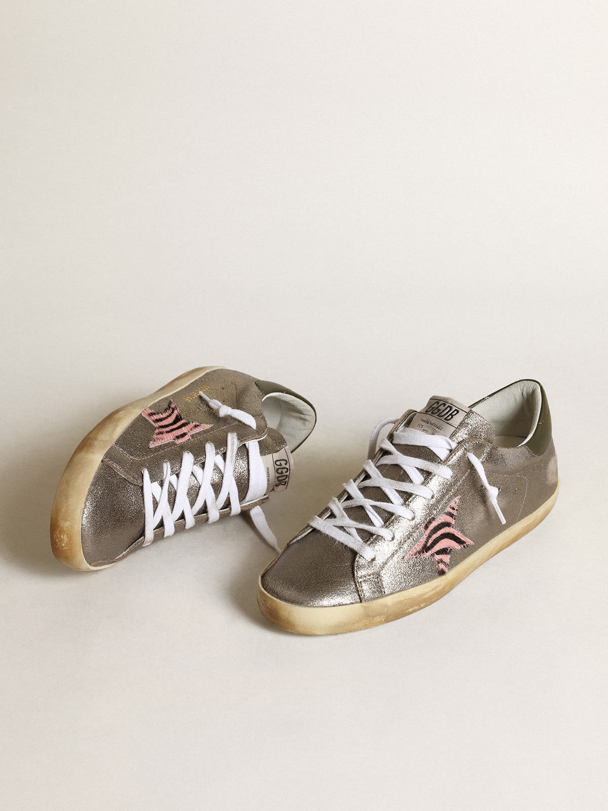 Golden Goose - Super-Star LTD in gray laminated suede with a pony skin star   in 