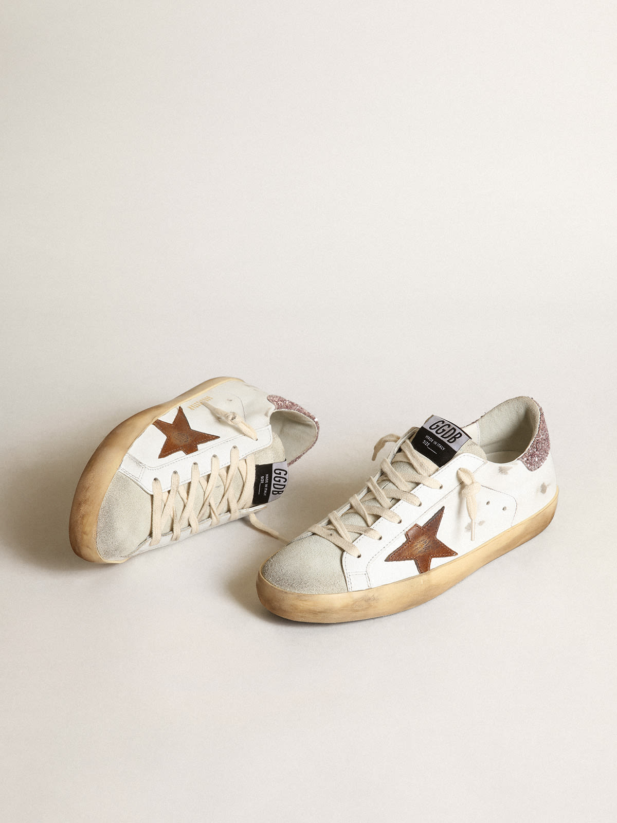 Golden Goose - Super-Star with a tan star and pink glitter heel tab in 