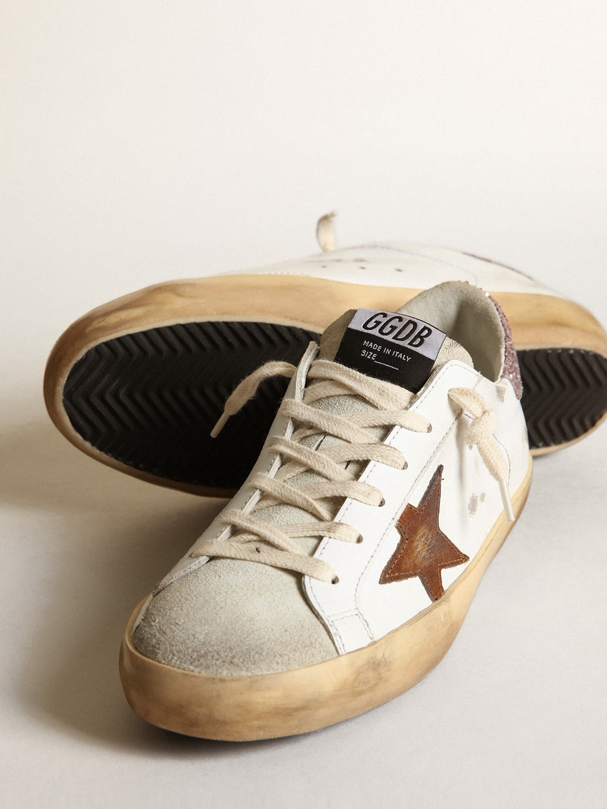 Golden Goose - Super-Star with a tan star and pink glitter heel tab in 