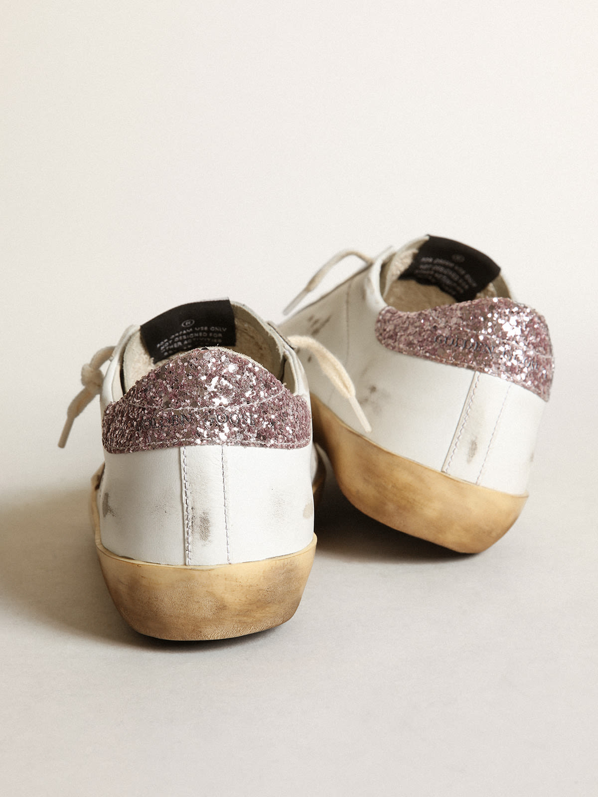 Golden Goose - Super-Star with a tan star and pink glitter heel tab in 