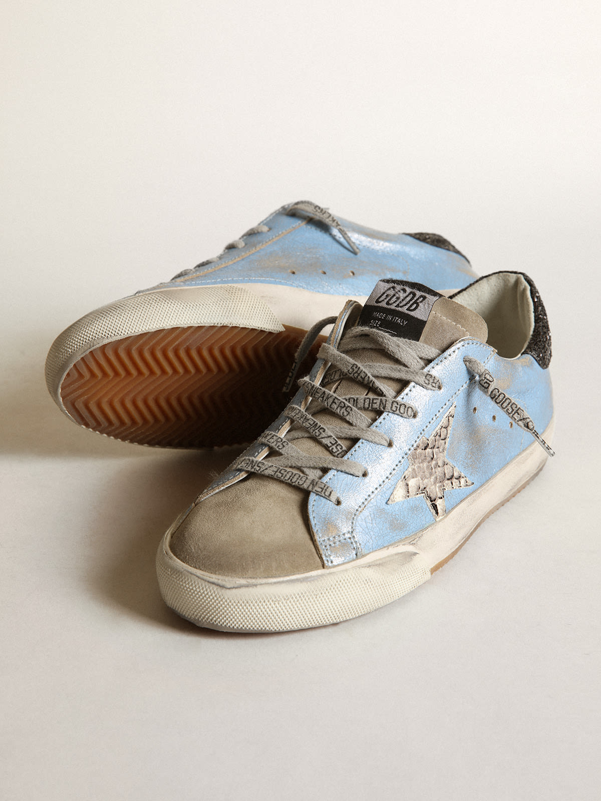 Golden Goose - Light blue Super-Star LTD with a gray star and glitter heel tab in 