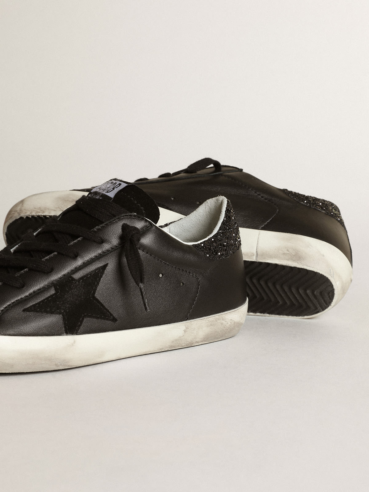 Golden Goose - Women's Super-Star in black nappa with black star and glitter heel tab in 