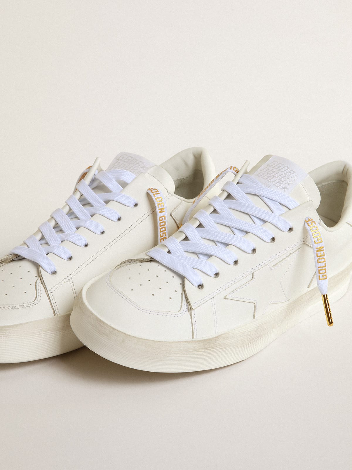 Golden Goose - White cotton laces with contrasting gold-colored logo in 