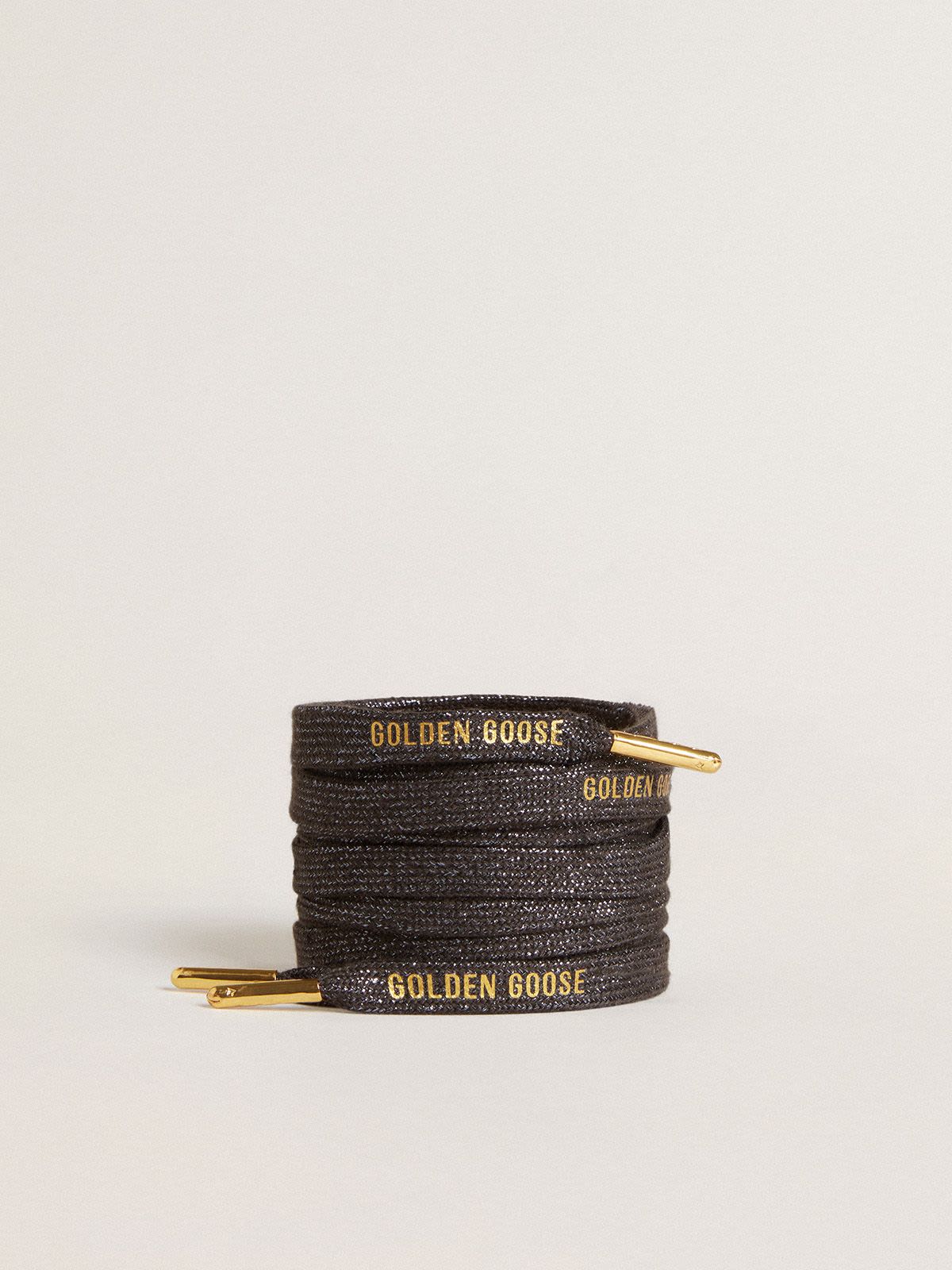 Black laces best sale with gold tips