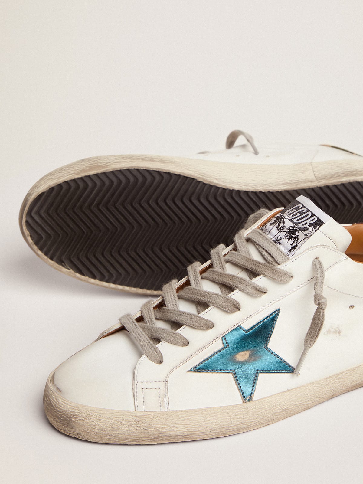 Golden Goose - Sneaker Super-Star con stella in pelle laminata blu petrolio e talloncino in tessuto ripstop camou in 