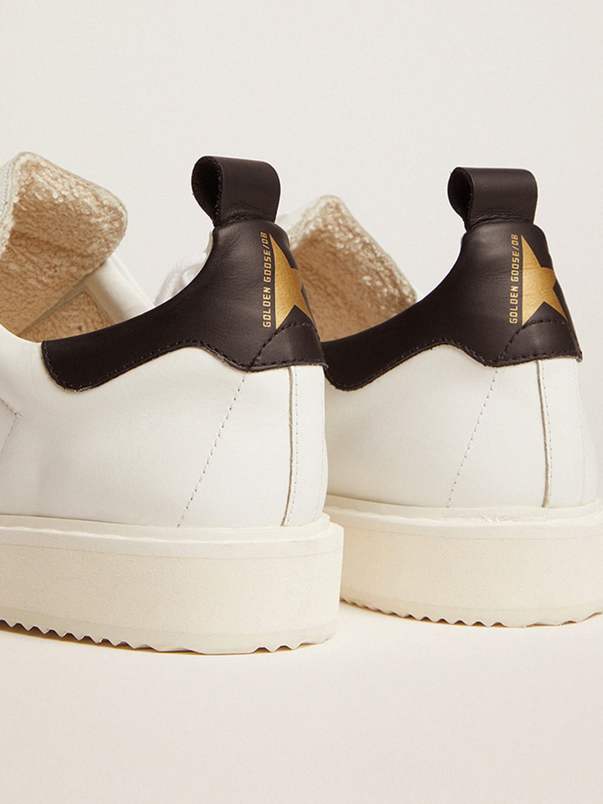 Golden Goose - Sneaker Starter aus weißem Leder mit Fersenpartie aus schwarzem Leder in 