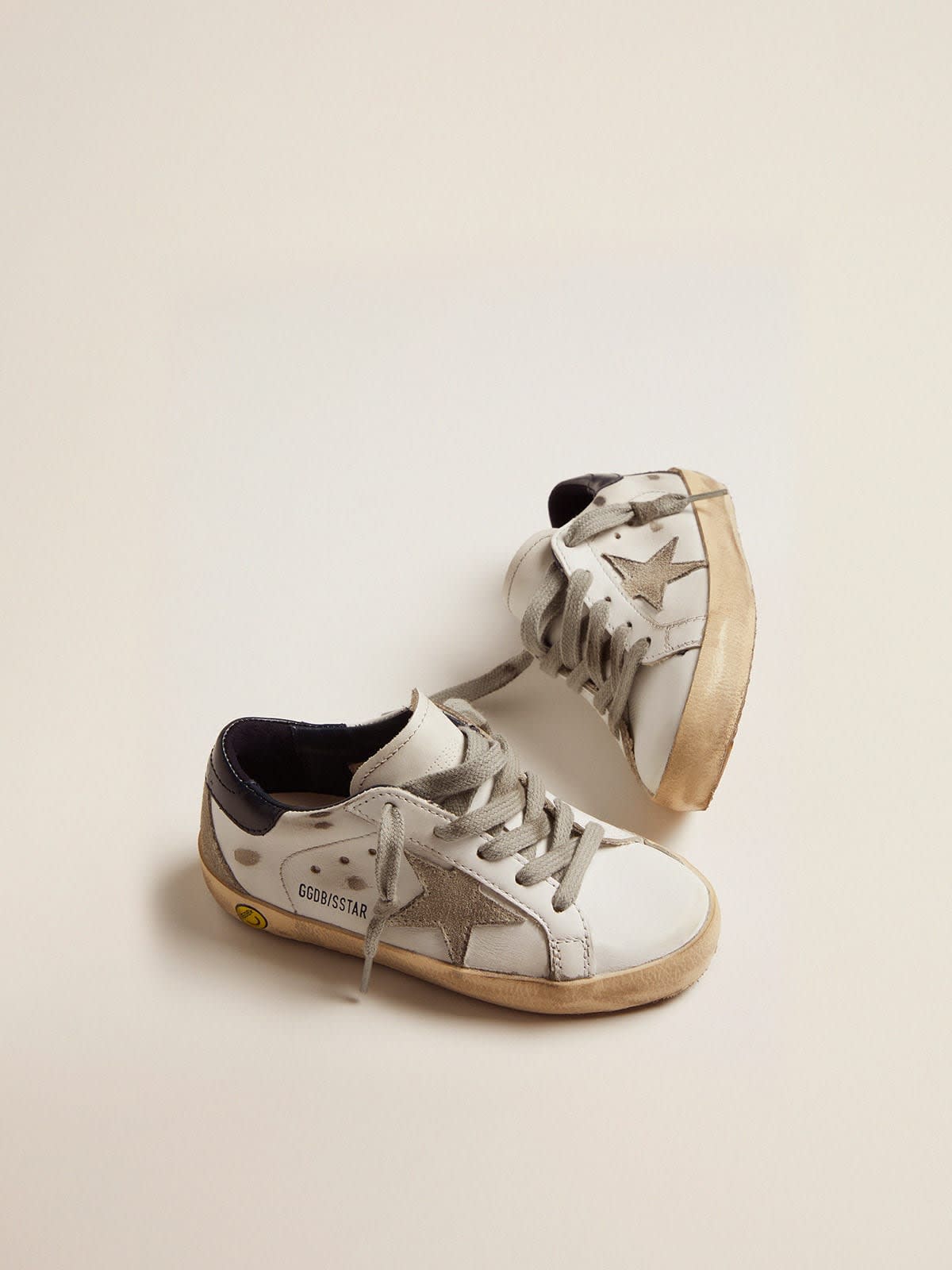 Golden Goose - White leather Super-Star sneakers with blue heel tab in 