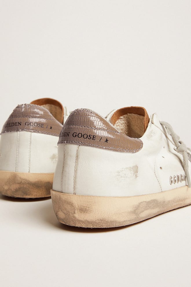 Super-star in white leather with silver glitter star and suede tongue |  Golden Goose