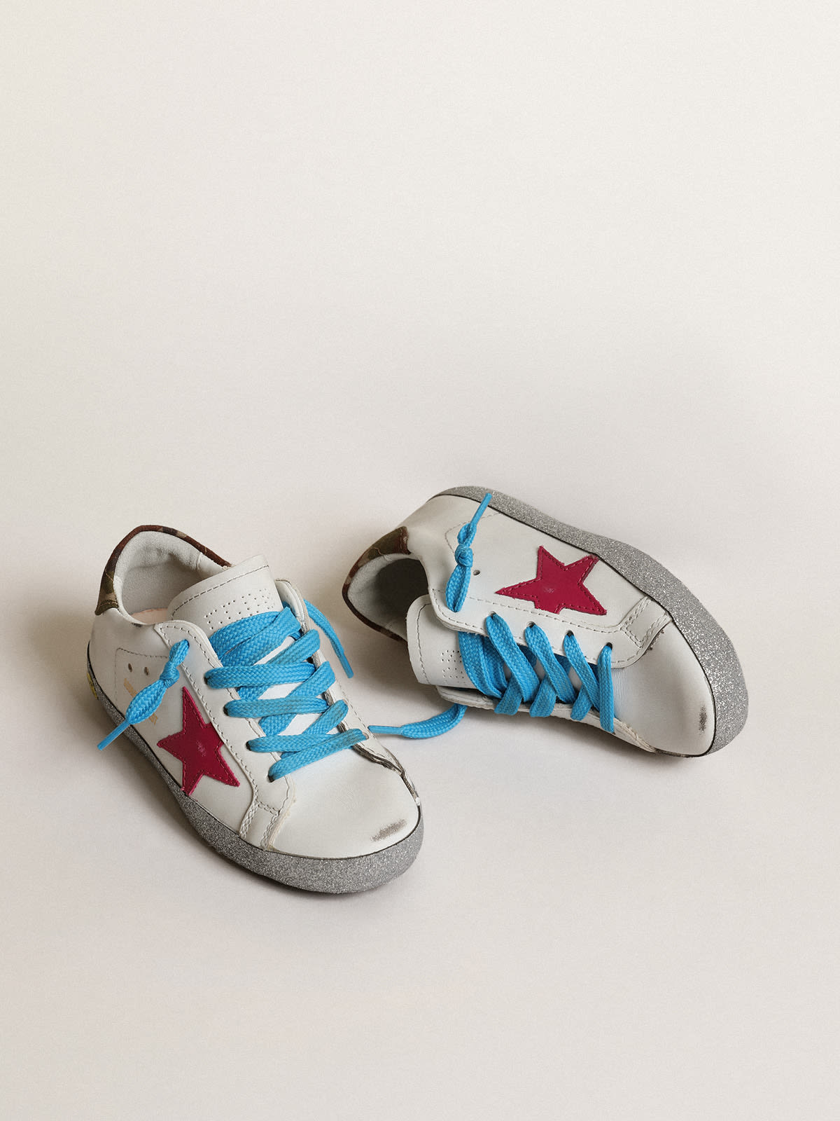 Golden Goose - Junior Super-Star LTD with fuchsia star and glitter foxing in 