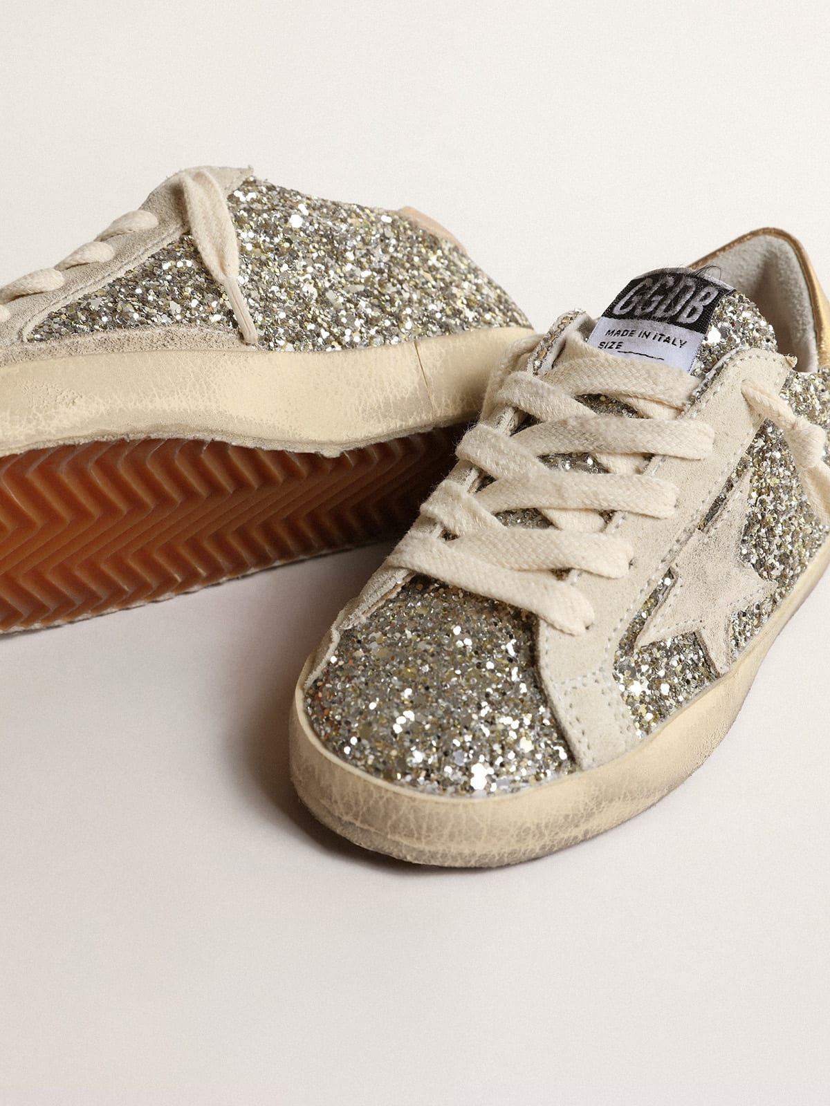 Golden Goose - Super-Star Junior in glitter with a suede star and gold heel tab in 