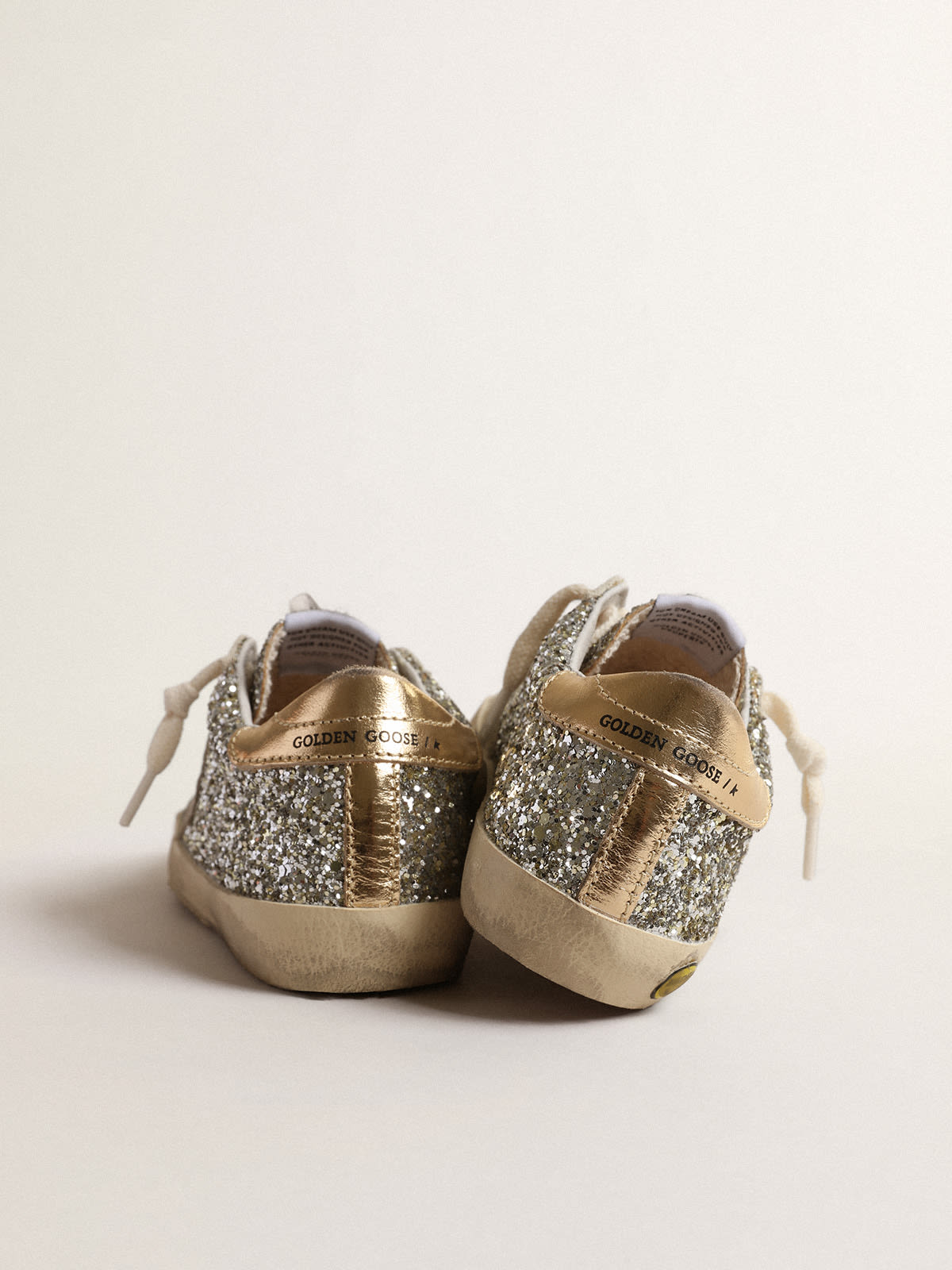 Golden Goose - Super-Star Junior in glitter with a suede star and gold heel tab in 