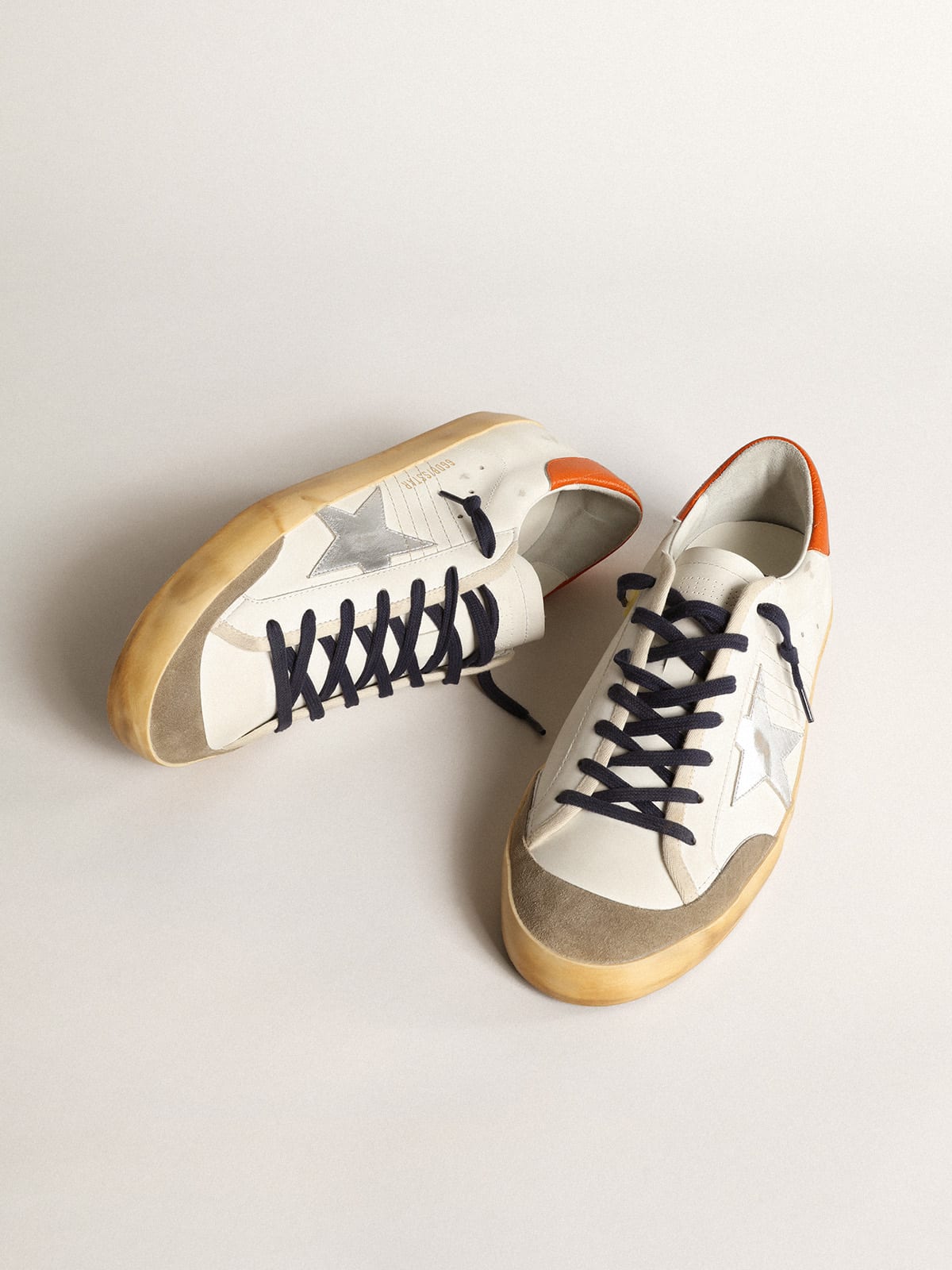 Golden Goose - Super-Star Penstar with silver star and orange heel tab in 