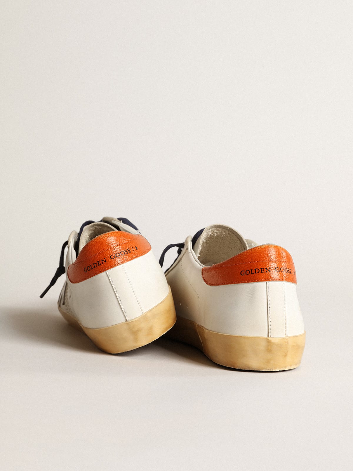 Golden goose cheap superstar arancione