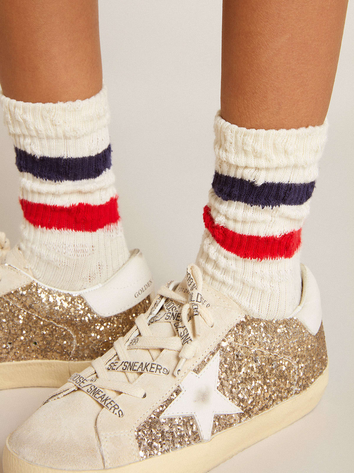 Golden Goose - Socks in distressed-finish white cotton with red and navy stripes in 