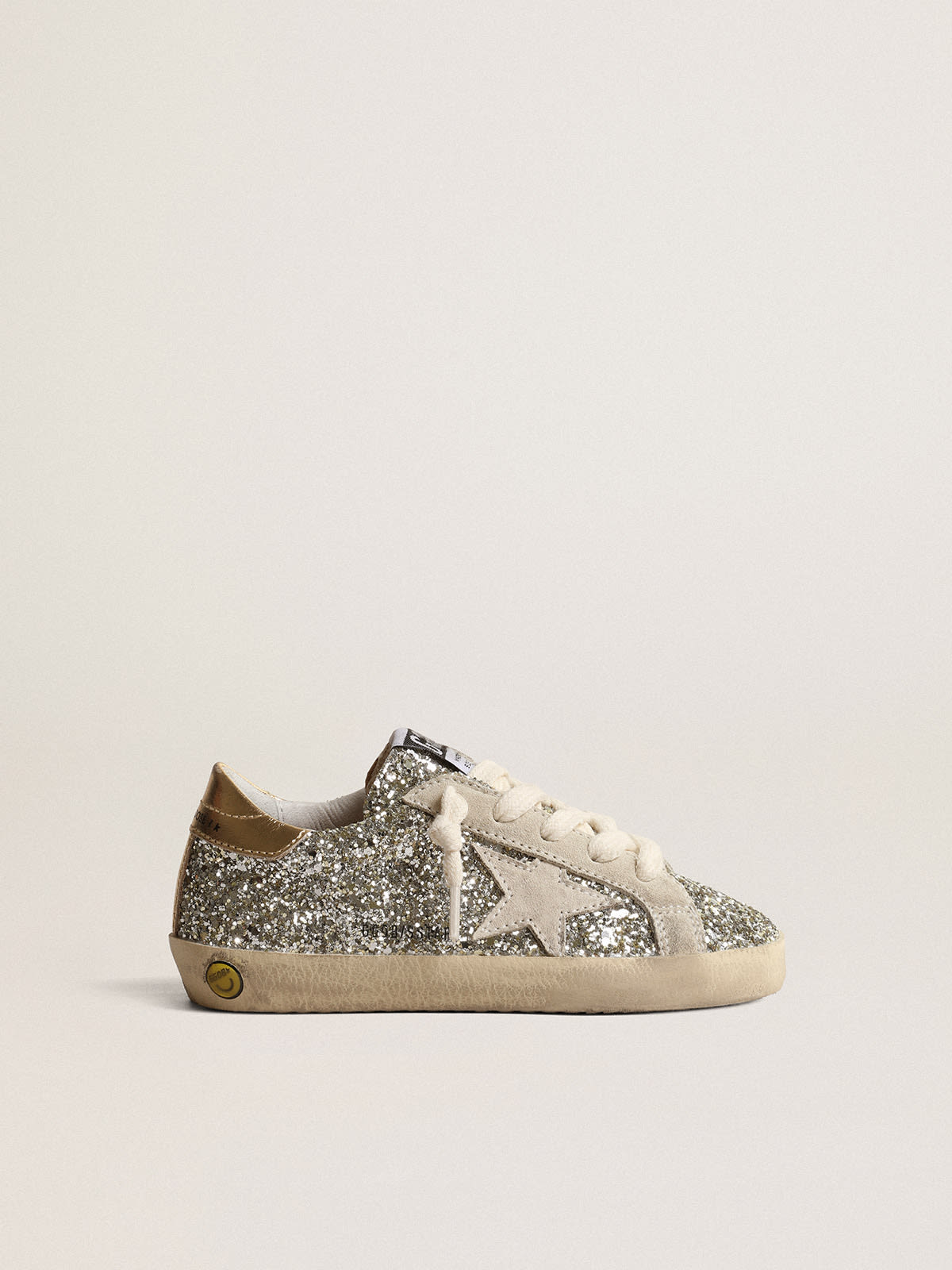 Super-Star Young in glitter with a suede star and gold heel tab ...