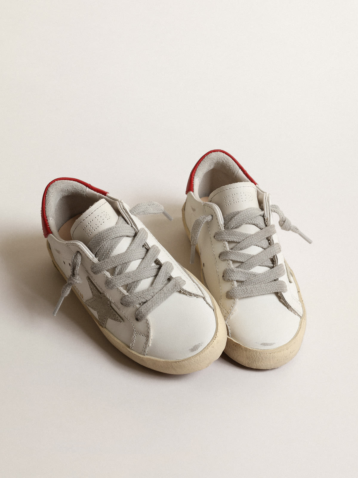 Golden Goose - Super-Star Young with suede star and red leather heel tab in 