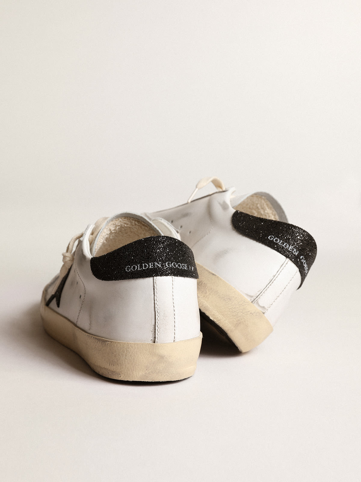 Golden Goose - Women's Super-Star with a black Swarovski crystal star and heel tab in 