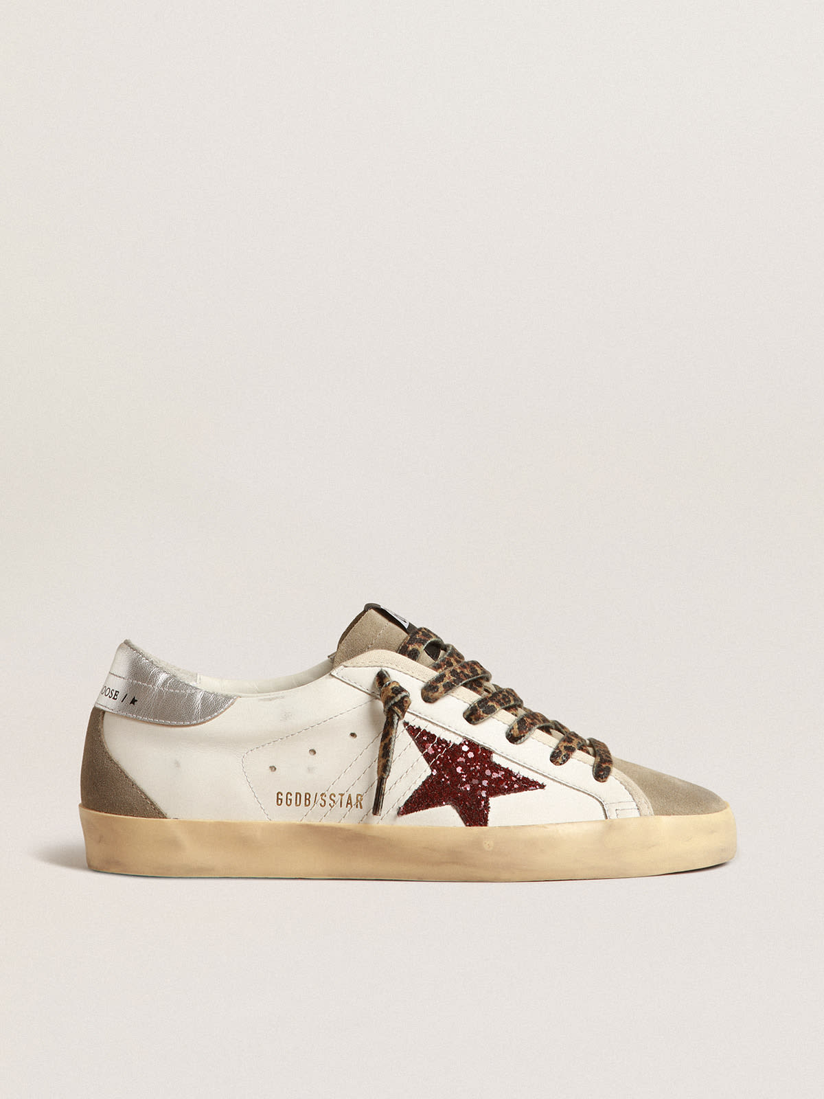 Super-Star sneakers with gold star and glittery black heel tab 