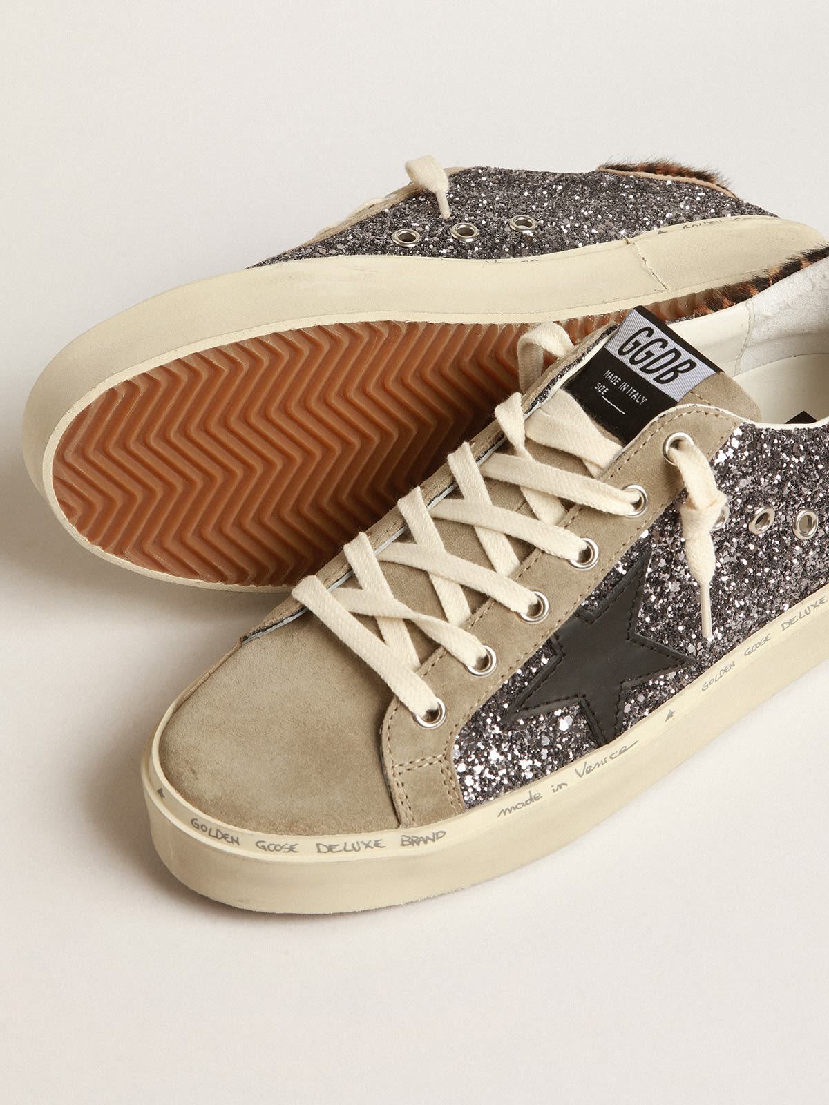 Golden Goose - Hi Star in dark gray glitter with a black leather star in 