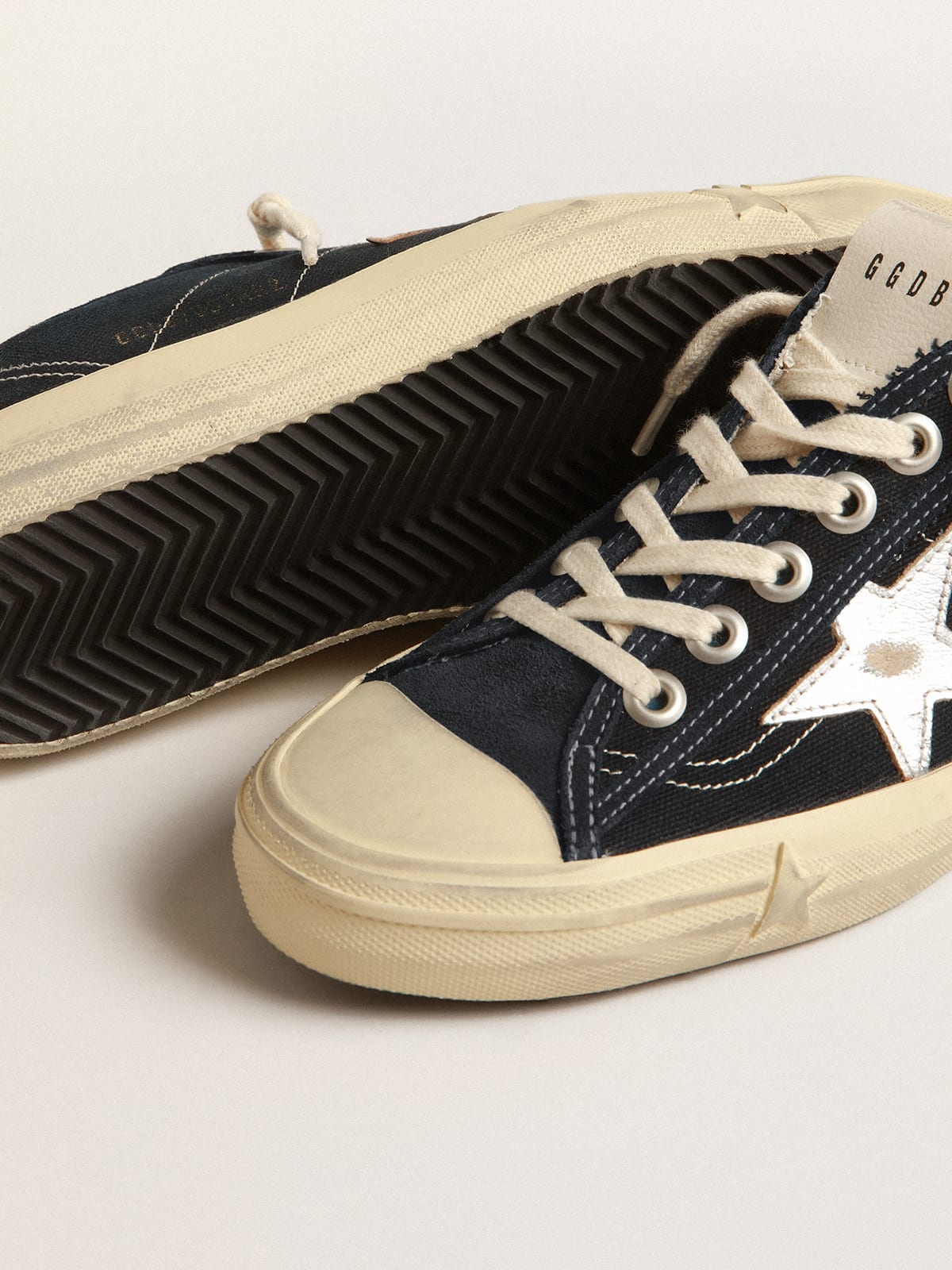 V-Star in navy-blue canvas with a silver laminated leather star