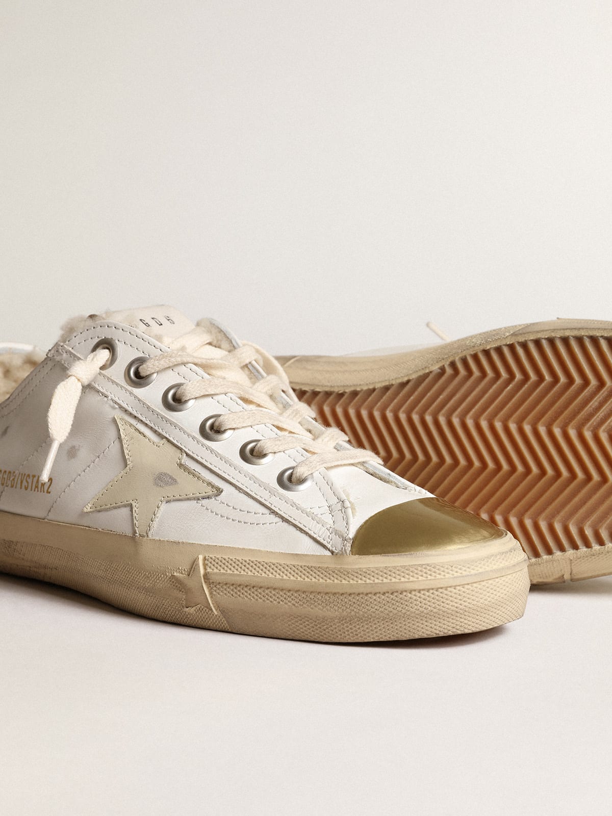 V Star sneakers with leather star and beige shearling lining