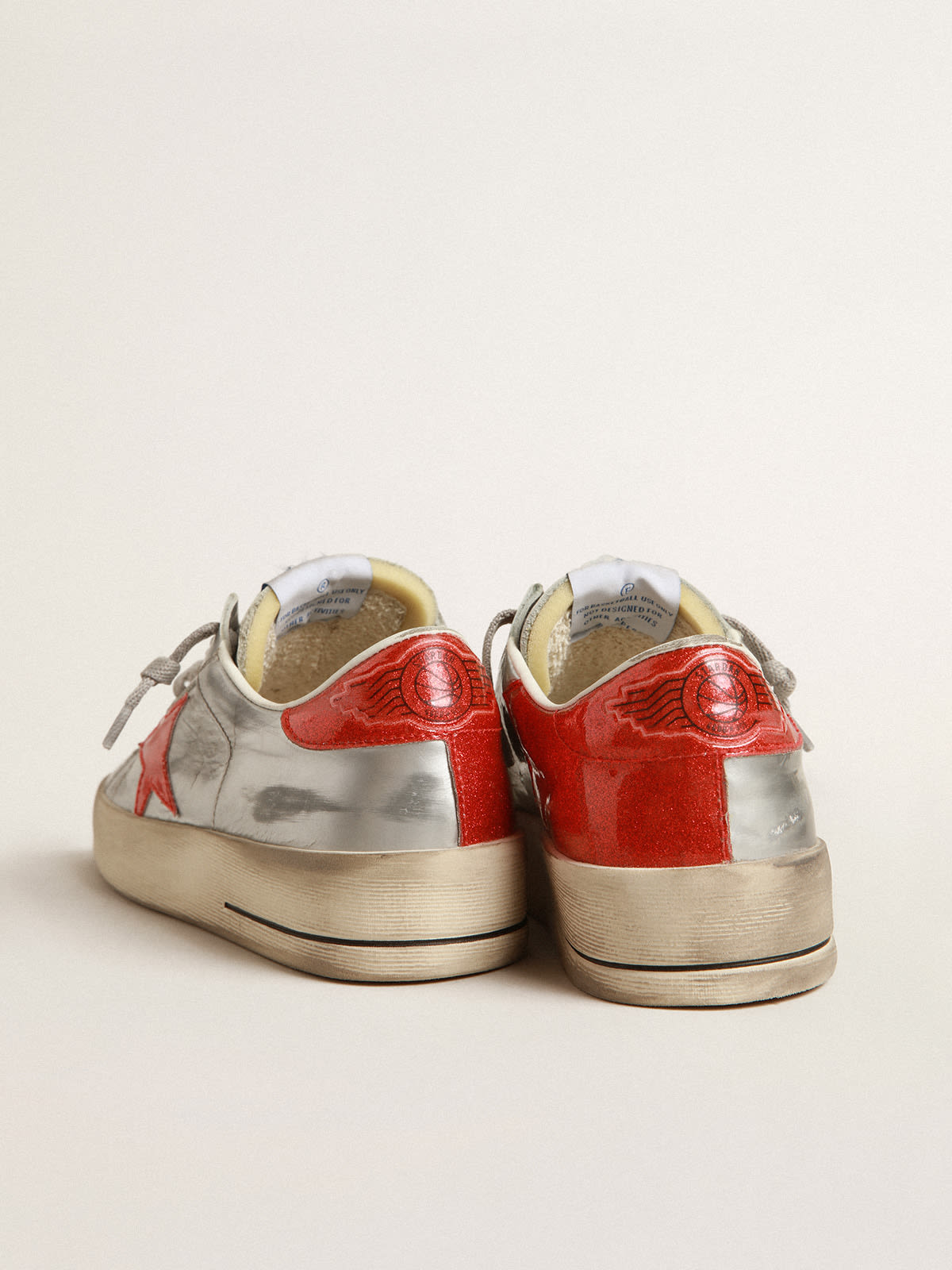 Golden Goose - Women's Stardan in laminated leather with red glitter inserts in 