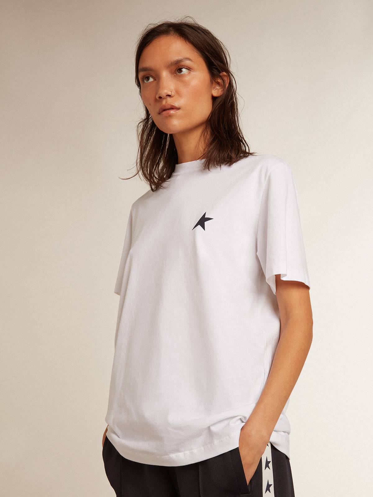 Golden Goose - Women’s white T-shirt with dark blue star on the front in 